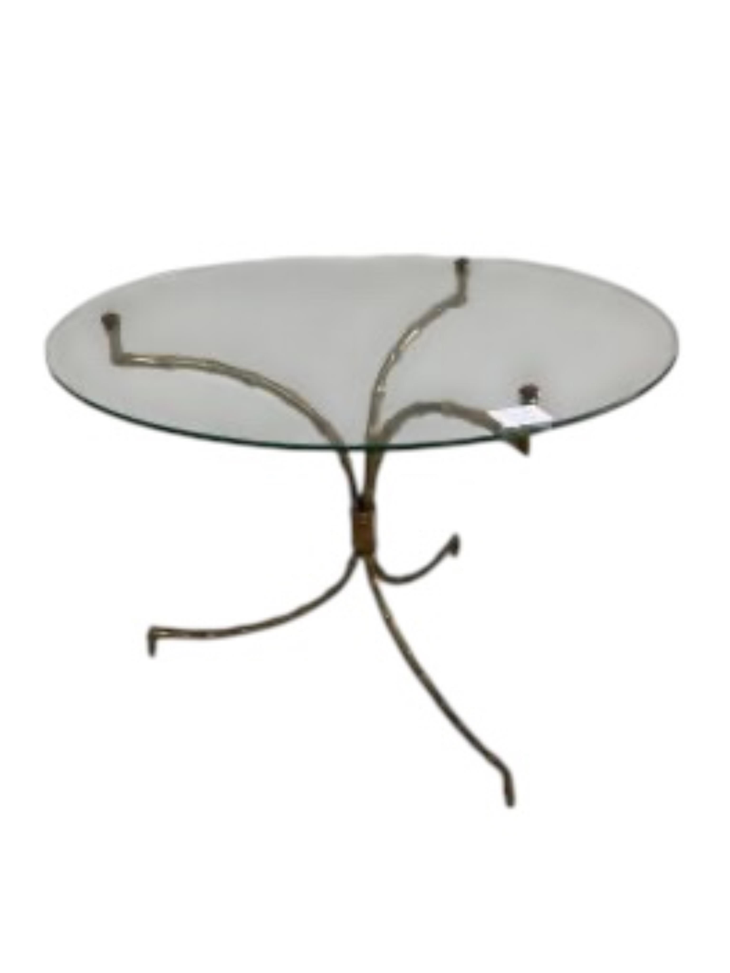 A Maison Jansen style circular glass top coffee table with faux bamboo tripod base, diameter 60cm, height 43cm